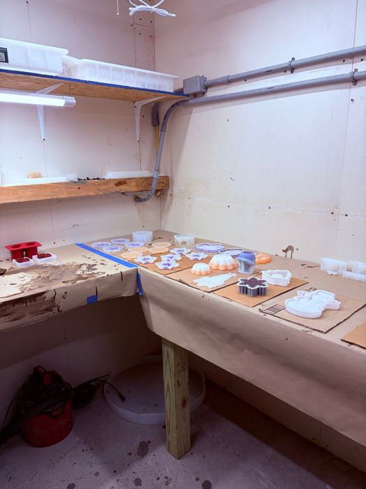 Molds lined up on the bench, inside the Everything Epoxy workshop